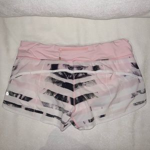 Lululemon Speed Up 2.5 Inch Shorts Size 10 Black and Pink Palm Tree Print